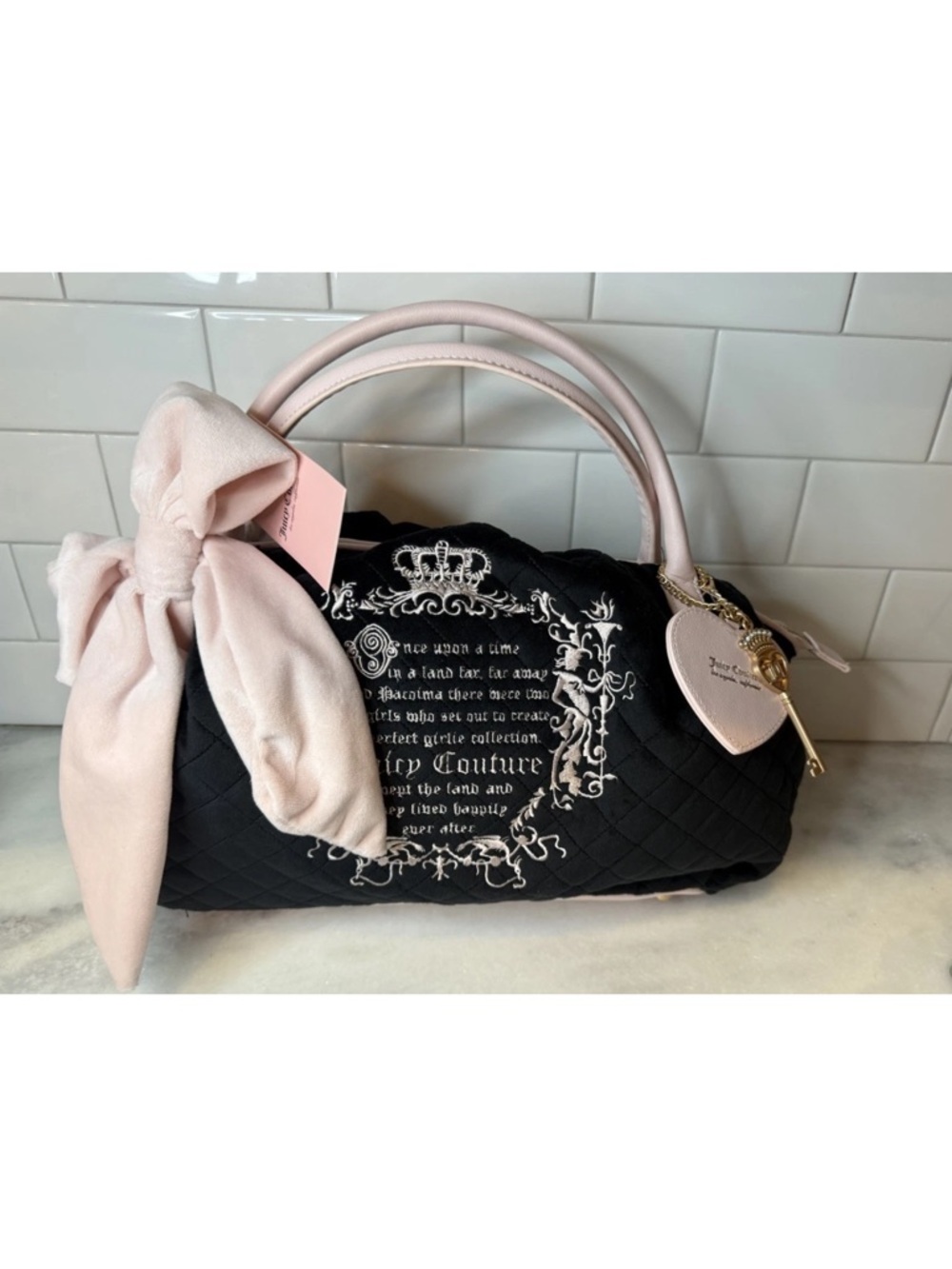 Juicy Couture Black Quilted Satchel with Pale Pink Handles & Bow Accent